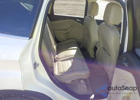 2016 Ford Escape Titanium z USA, uszkodzony, nr VIN 1FMCU9J91GUC53569